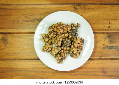 Weasel Coffee Beans On Dish