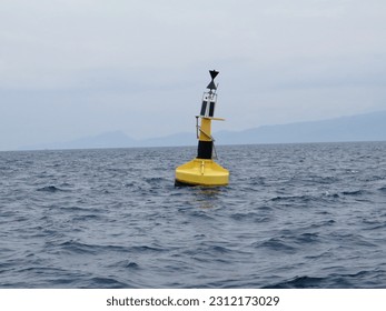  Weather buoy. Oceanographic buoy on the surface of the sea.                              