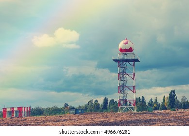 Weather Radar Station.  Natural Landscape With Storm Clouds And Rainbow 