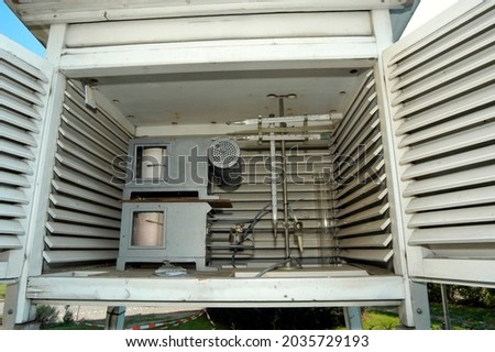 weather station with different measuring instruments, observing weather conditions in meteorology