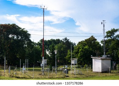 Weather Station For Monitoring Ambient Air Pressure, Humidity, Wind Vane And Temperature In The Forest And Meadow In Nature. Meteorology Concept Image