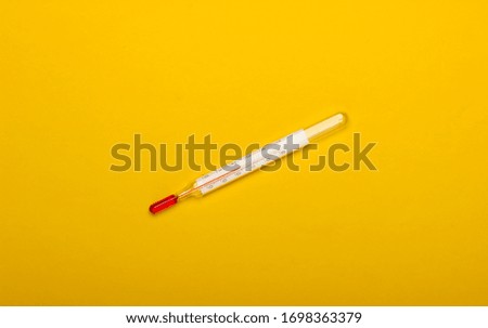 Similar – Medical syringe on colorful background.