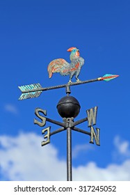 Weather Vane Vane For Measuring Wind Direction With A Rooster And The Cardinal Points