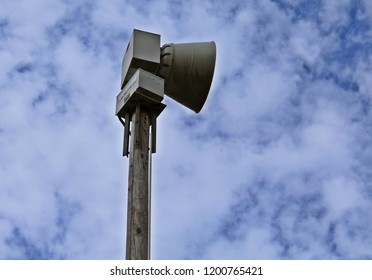 Weather Warning Siren On A Wooden Pole