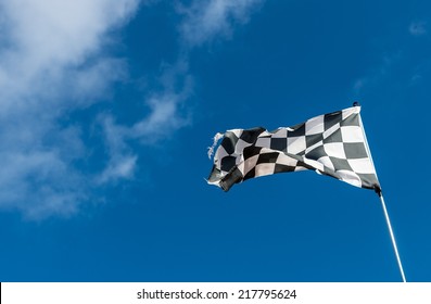 Weather-beaten Racetrack Finish Flag Or Chequered Flag.