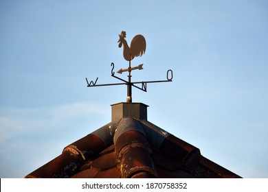 Weathercock on a house gable