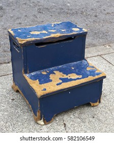 Weathered Blue Shoe Shine Stand On City Sidewalk.