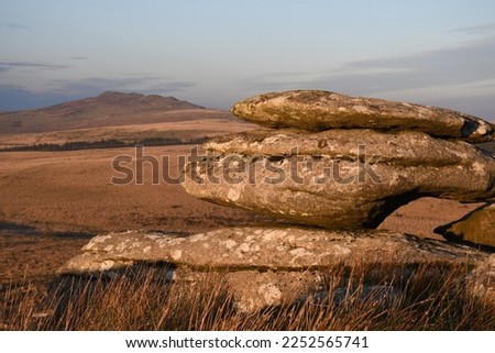 A weathered boulder at sunset on Hawk's Tor Temple Bodmin Moor Cornwall Stock fotó © 