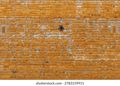 Pared ladrillo desgastado con