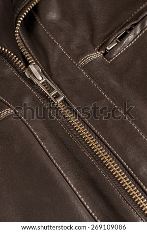 Weathered Brown Leather Jacket Close-up View