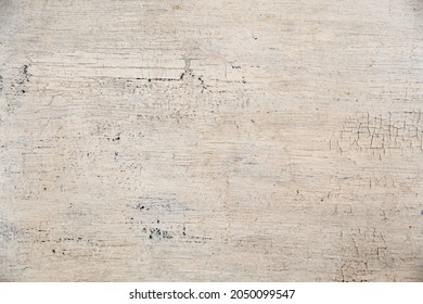 Weathered cracked paint background. Grunge white vintage texture pattern for overlaying artwork
