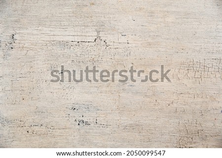 Weathered cracked paint background. Grunge white vintage texture pattern for overlaying artwork
