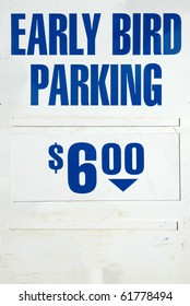 Weathered Early Bird Parking Sign With Blue Text