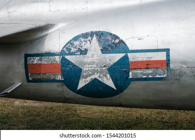 Weathered, grungy US Airforce logo on old warbird.