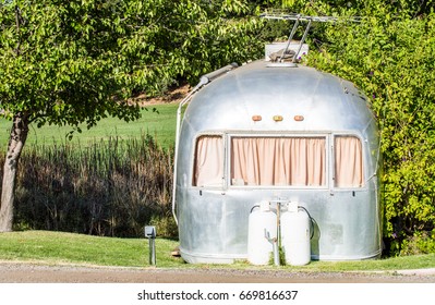 Weathered Mobile Home In Trailer Park