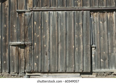 A Weathered Old Barn Door Background.