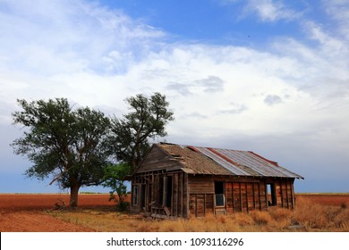 Weathered Old Farmhouse On The Texas Plains