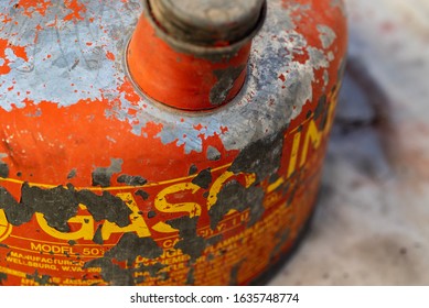 Weathered Peeling Red Paint On Vintage Metal Gas Can