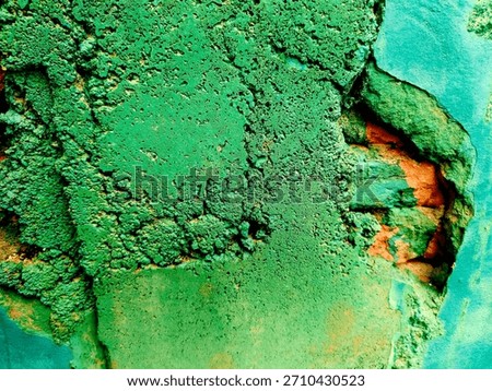 Weathered and peeling wall texture with aged paint, stains, and grunge patterns in earthy tones. Ideal for backgrounds, vintage designs, urban decay themes, and abstract textured surfaces.
