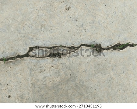 Weathered and peeling wall texture with aged paint, stains, and grunge patterns in earthy tones. Ideal for backgrounds, vintage designs, urban decay themes, and abstract textured surfaces.
