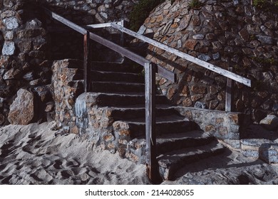 Weathered Sandy Stone Stairs And Stone Walls On Sandy Shore