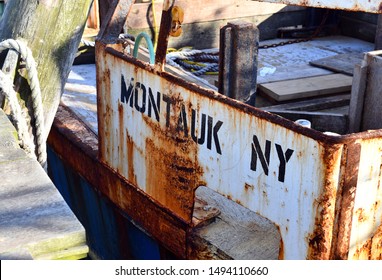 Weathered Stenciling On Commercial Fishing Boat At Montauk, New York