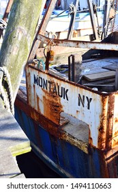 Weathered Stenciling On Commercial Fishing Boat At Montauk, New York