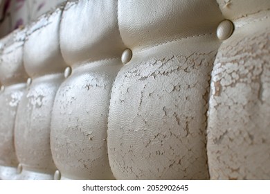 Weathered White Leather Soft Tufted Furniture Or Bed Panel Upholstery. Bad Quality Leather. Selective Focus