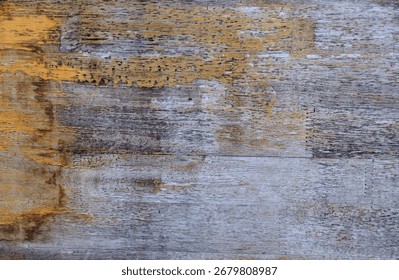 Weathered wood texture rustic surface aged timber distressed pattern natural grain gray and yellow tones vintage background rough material organic feel abstract design