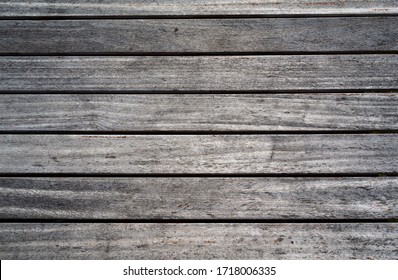 Weathered Wooden Planks Of Seaside Dock For Background And Texture