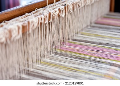 Weaving equipment on the antique loom and thread
Weaving Shuttle. Weaver Tools, Weaver products. National craft in Latvia. 