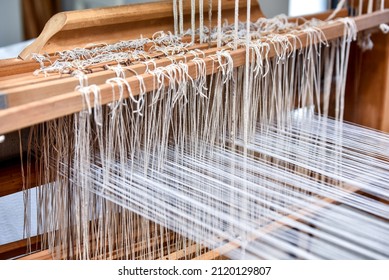 Weaving equipment on the antique loom and thread
Weaving Shuttle. Weaver Tools, Weaver products. National craft in Latvia. 