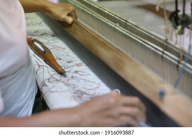 
a Weaving from silk threads
