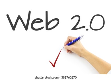 Web 2.0 describe a second generation of the World Wide Web that is focused on the ability for people to collaborate and share information online. Business woman writing web 2.0. on imagitive sceeen.