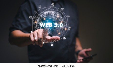 Web 3.0 concept image with a man using a laptop. Technology and WEB 3.0 concept. - Shutterstock ID 2231104537