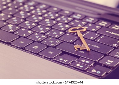 Web Access Control, Online Security Concept : Retro / Vintage Key On A Laptop Keyboard, Depicts Network-level Access, Managing SSH Sensitive Keys And Monitor User's Session To Avoid Malicious Damage