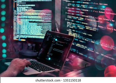 Web Or Application Development, Business And Technology Concept. Programmer, Man Software Developer Hands Coding HTML, Programming Javascript On Laptop Computer Screen, Back View Close Up