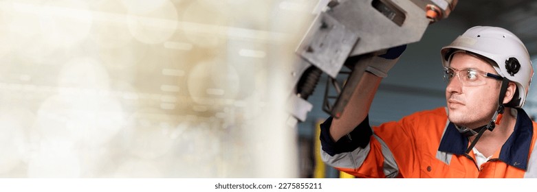 Web banner team of male engineers meeting to inspect computer-controlled steel welding robots. Plan for rehearsals and installation for use. - Shutterstock ID 2275855211