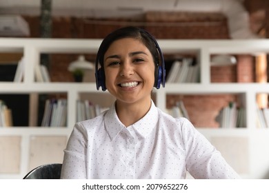 Web Cam Head Shot Indian Woman Applicant Pass Job Interview Remotely By Video Call. Student Participates In Educational Webinar Seated Alone In Library. Virtual Event Meeting Profile Picture Concept