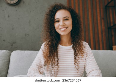 Web cam view head shot close up young woman in casual clothes sits on sofa couch record get video call talk use pc laptop stay home hotel flat rest relax spend free spare time in living room indoor - Shutterstock ID 2367234569