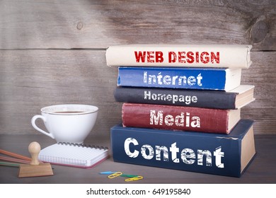 web design concept. Stack of books on wooden desk
