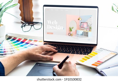 Web design desktop with  laptop and tools  - Shutterstock ID 1910100832