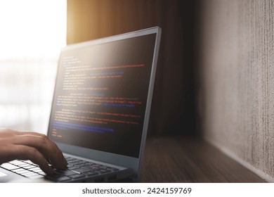 Web design and security protection concept. Programmer programming web development code on a laptop computer. with copy space