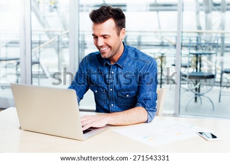 Web designer putting his new aplication to test