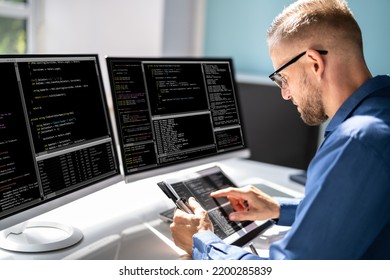 Web Developer Looking At Code. Computer Database Software Programming