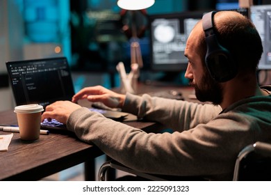 Web developer with physical disability writing code, computing big data to create app interface. Using html script and database source to program artificial intelligence algorithm.