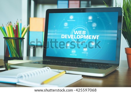 WEB DEVELOPMENT chart with keywords and icons on screen
