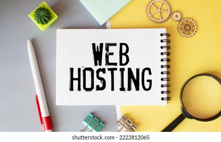 Web hosting business text concept. Text in notebook on table - Shutterstock ID 2222812065
