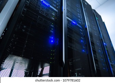 Web network, internet telecommunication technology, big data storage, cloud computing computer service business concept: server room interior in datacenter