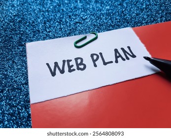 Web plan writting on blue background.